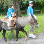 My daughter riding a pony