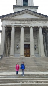 Boy and girl in front of the National Christian Church