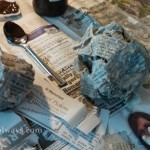 Newspaper crumpled up in a ball and glued together with wallpaper paste
