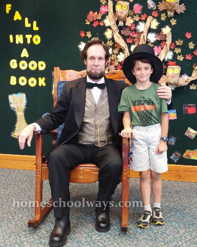Boy with an actor impersonating Abraham Lincoln