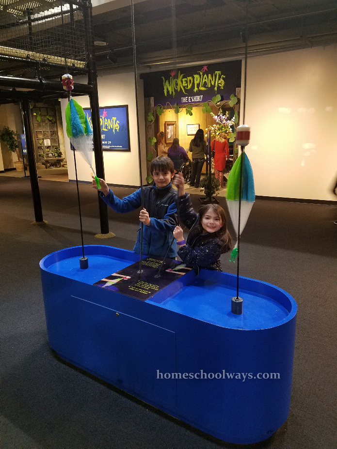 Boy and girl play at Adventure Science Center