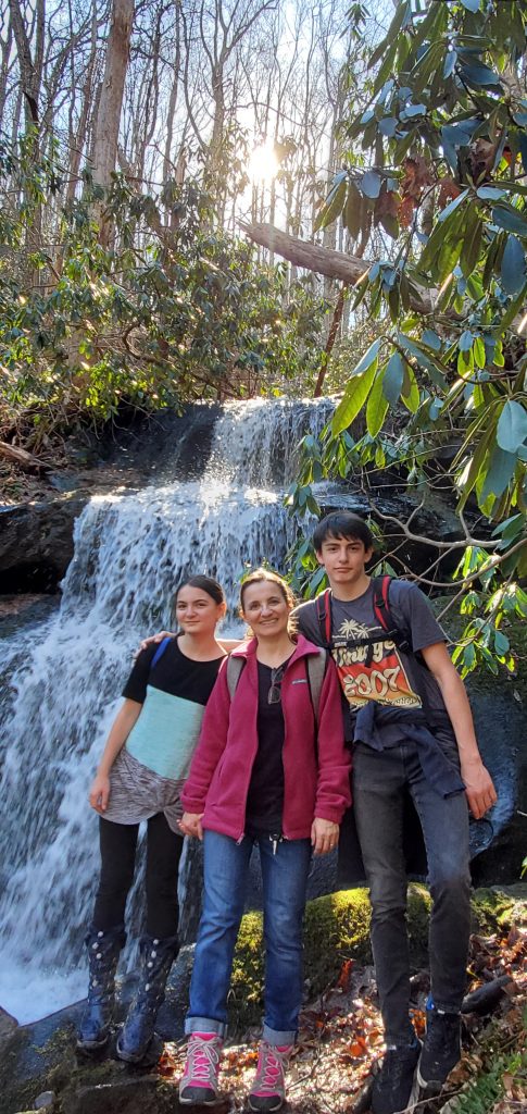 Mom, daughter, son, waterfall