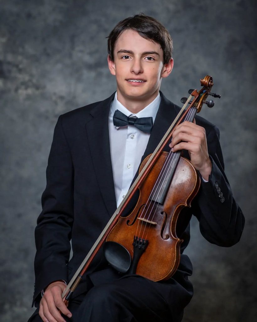 Teenage boy with violin